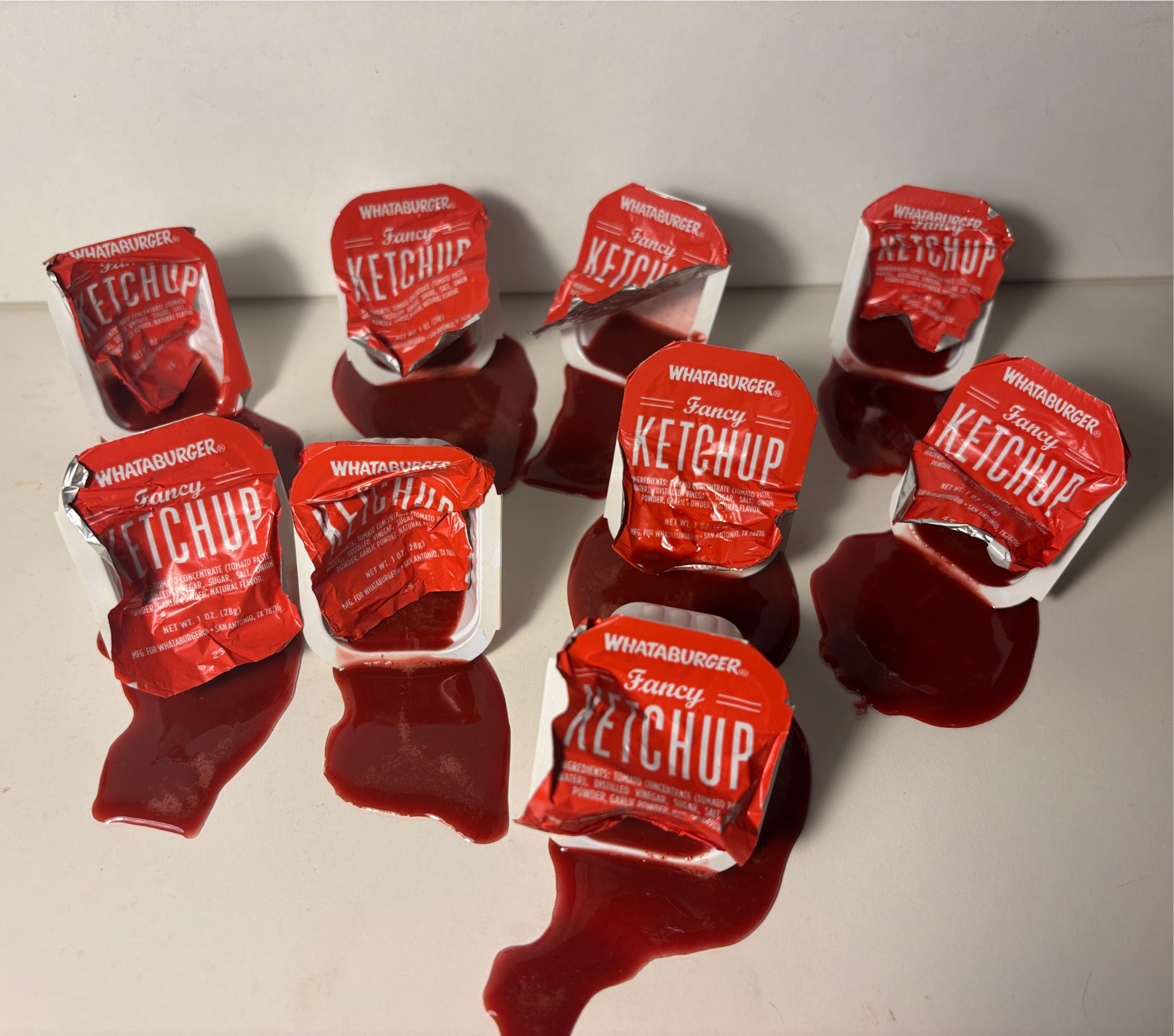 Fake ketchup container spills from a Texas burger chain