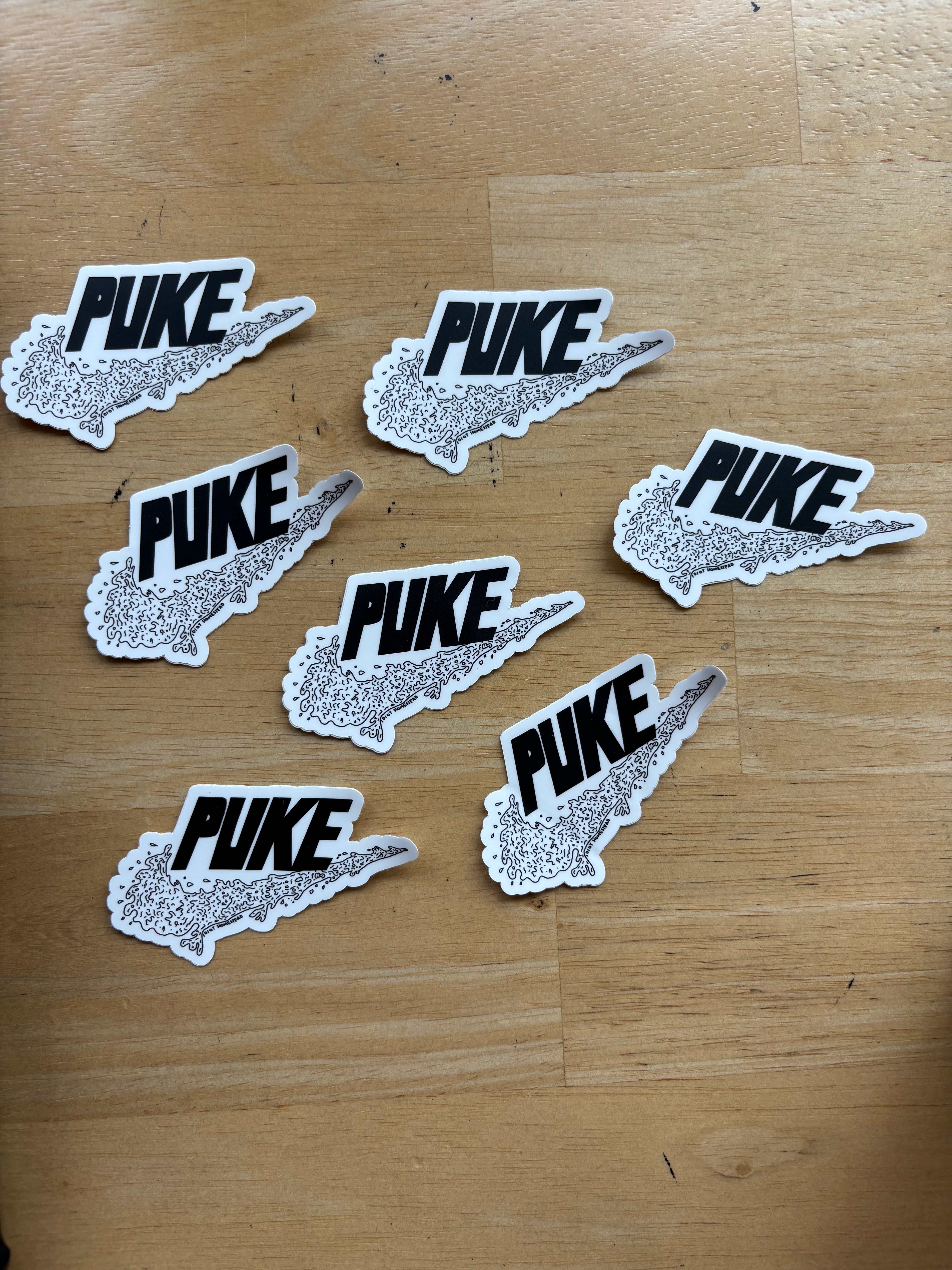 “PUKE” sticker