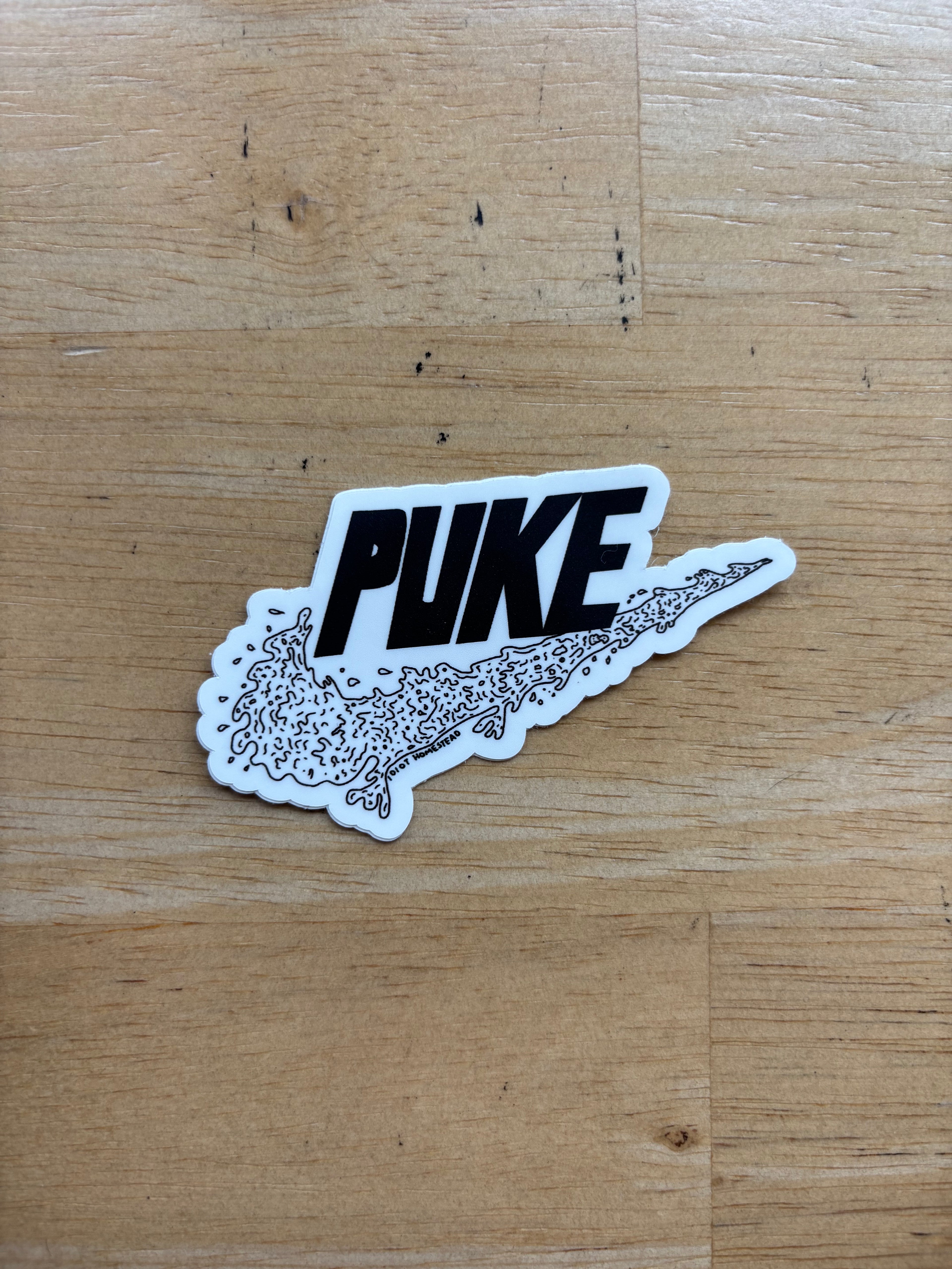 “PUKE” sticker